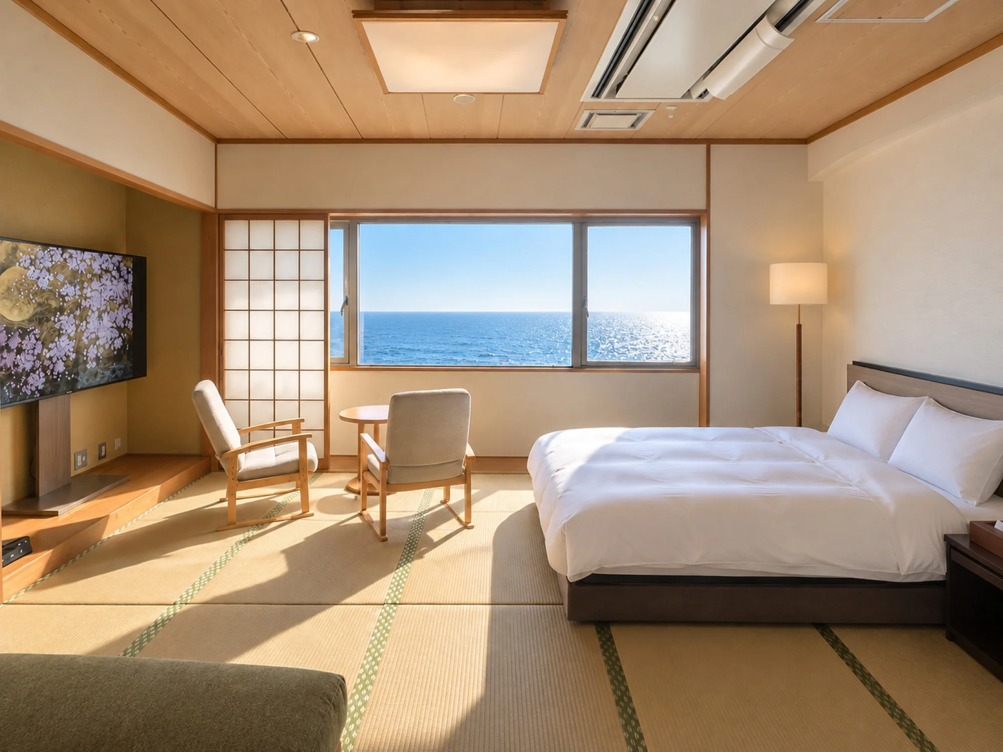 A Japanese-style room with tatami and beds