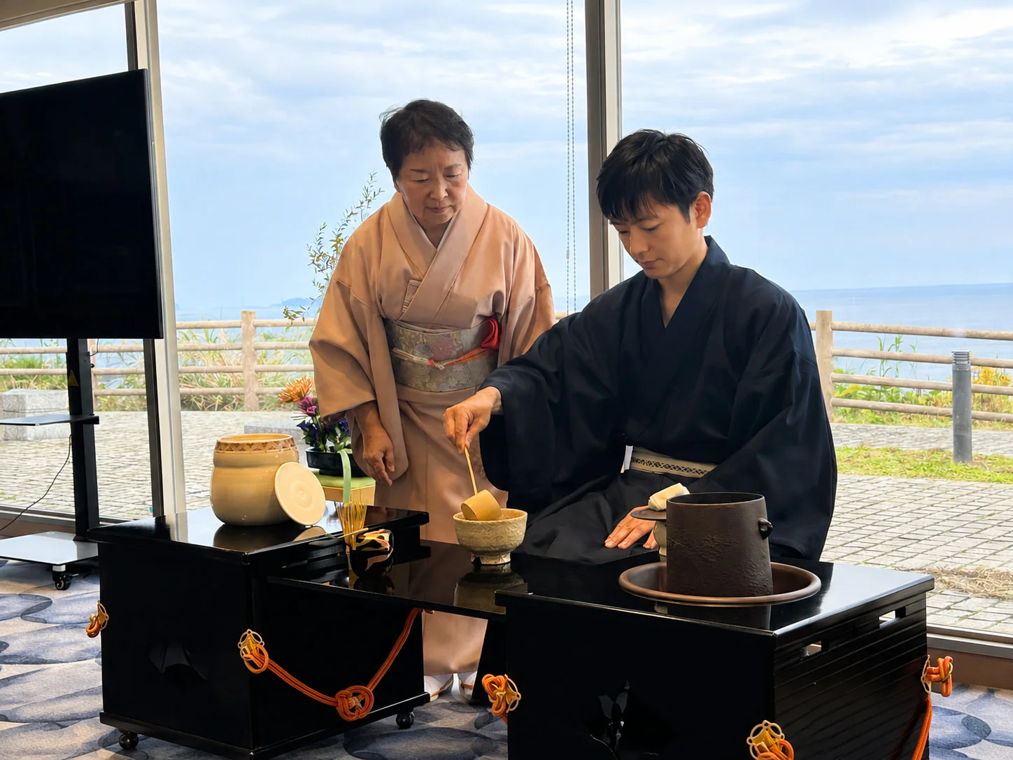 Hands preparing tea